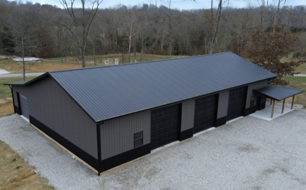 Charcoal metal commercial building aerial view with lean-to